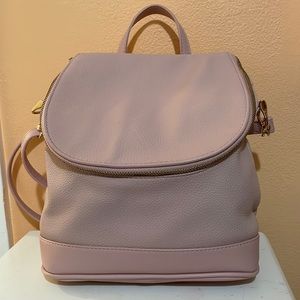 Cute pink and gold purse/backpack!